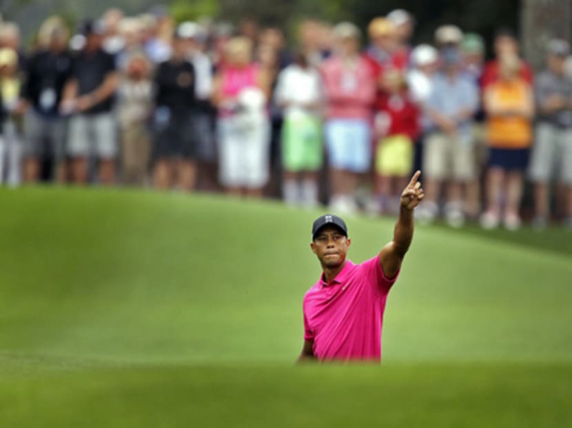 After playing 11 holes of practice on Monday, Woods believes he could win his 15th Major. Photo: AP