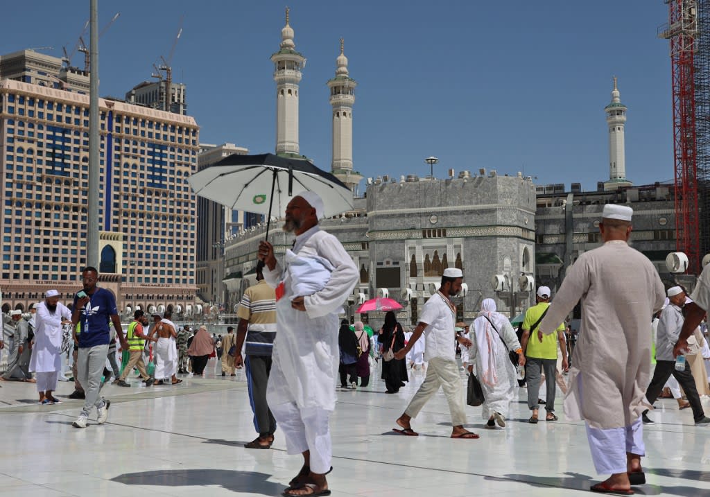 Muslim pilgrims arrive outside the Grand Mosque in Saudi Arabia's holy city of Mecca on July 5, 2022. Muslim pilgrims arrive outside the Grand Mosque in Saudi Arabia's holy city of Mecca on July 5, 2022. 