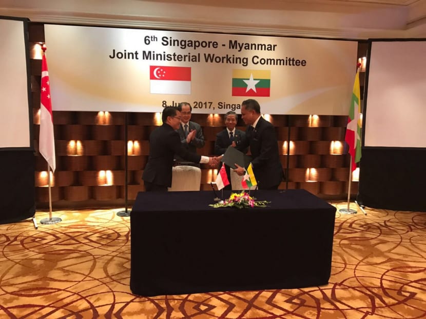 The MOU signing yesterday with (from left) IE Singapore’s assistant CEO Tan Soon Kim, Minister for Trade and Industry (Trade) Lim Hng Kiang, Myanmar’s Union Minister for Planning and Finance Kyaw Win and Myanmar Investment Commission secretary U Aung Naing Oo. PHOTO: IE Singapore