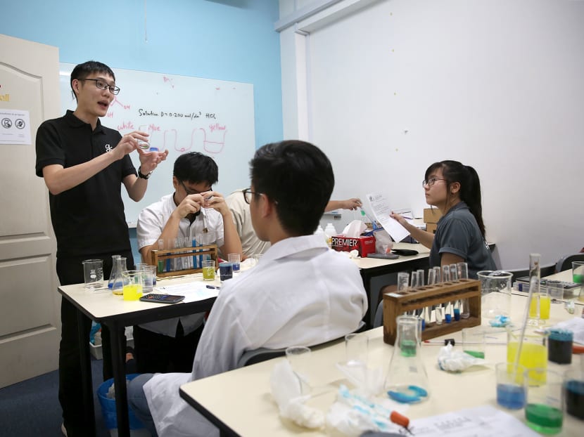 Mr Gavin Ng, director at Gavin's Tuition, conducts a Junior College science practical lesson. Mr Gavin Ng, director at Gavin's Tuition, conducts a Junior College science practical lesson.