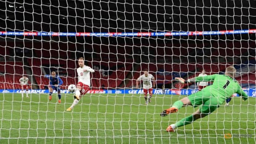 Football: Eriksen penalty earns Denmark win over 10-man England Football: Eriksen penalty earns Denmark win over 10-man England