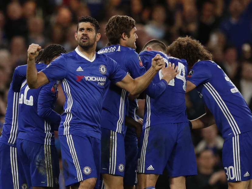 Chelsea players celebrate scoring in the recent FA Cup tie against Manchester United. Photo: Reuters