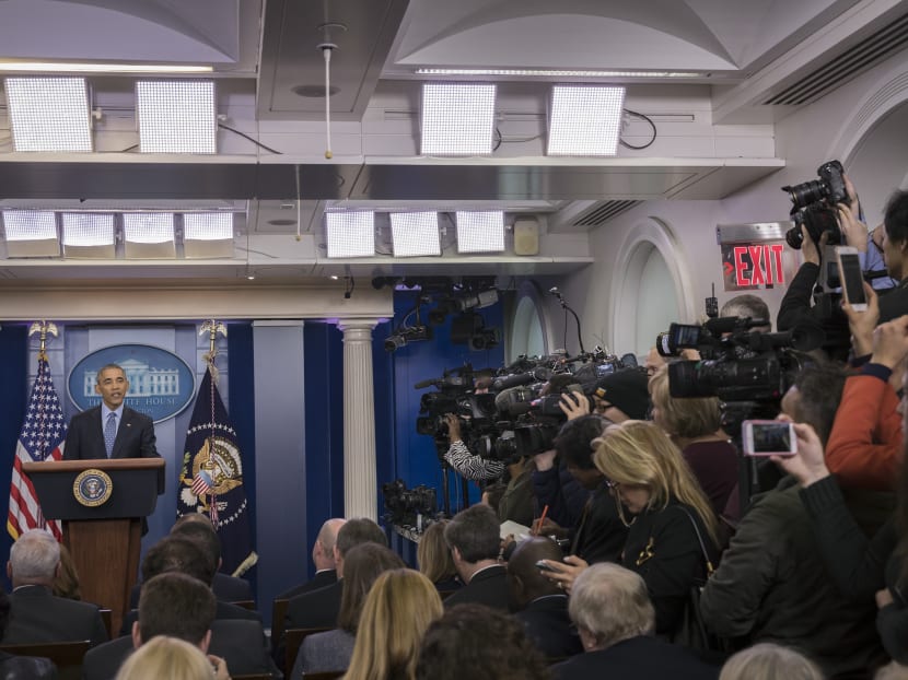 Reporters pack together as President Barack Obama speaks during his final news conference as president in the James S Brady Press Briefing Room of the White House, in Washington, Jan 18, 2017. Photo: New York Times