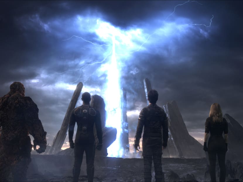This photo provided by courtesy Twentieth Century Fox shows, The Thing, from left, Michael B. Jordan as Johnny Storm, Miles Teller as Dr. Reed Richards, and Kate Mara as Sue Storm, in a scene from the film, "Fantastic Four." Photo: AP