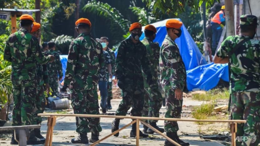 Indonesian military jet crashes into residential area Indonesian military jet crashes into residential area
