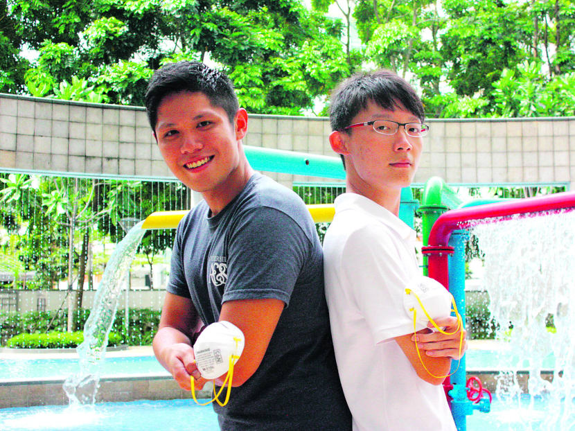 Mr Jeremy Chua (left), with Mr Raymond Yeh, used social media to help people during the recent haze crisis. Photo: Xabryna Kek