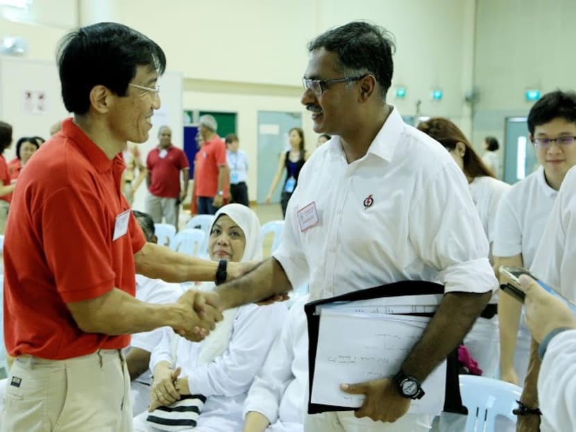 The Singapore Democratic Party's Chee Soon Juan (left) shakes hands with the People Action Party's Murali Pillai on Nomination Day on April 27, 2016. Photo: Elections Department of Singapore