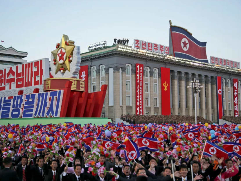 North Korean soldiers parade in massive anniversary celebration