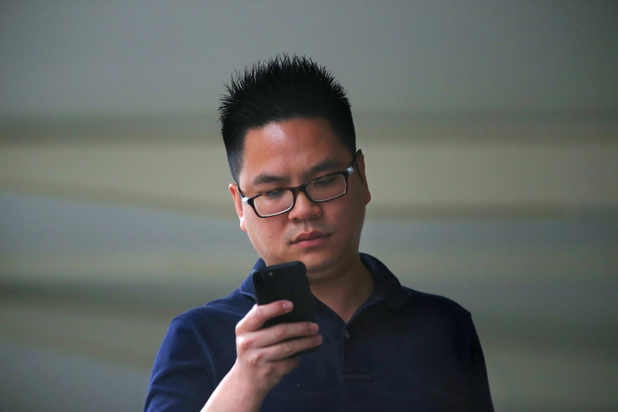 Former exco member of Workers’ Party youth wing on trial for stealing S$52,000 from ex-girlfriend