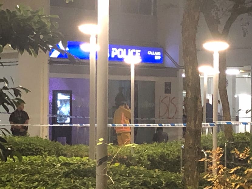 The area around the Kallang Neighbourhood Police Post, which is an e-kiosk, was cordoned off by police tape. The area around the Kallang Neighbourhood Police Post, which is an e-kiosk, was cordoned off by police tape.