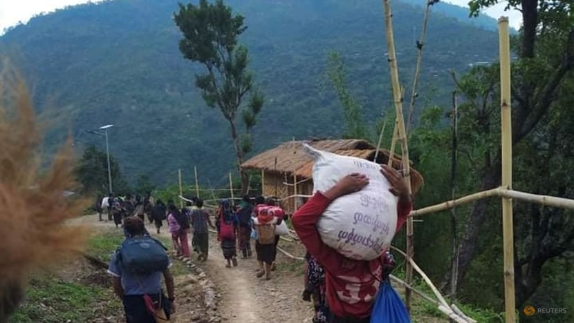 Myanmar town near India border sees exodus as thousands flee fighting Myanmar town near India border sees exodus as thousands flee fighting