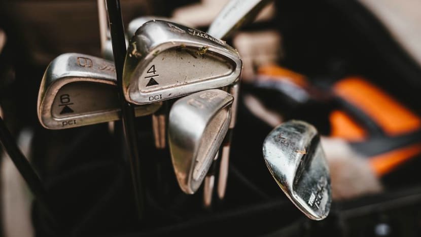 Woman jailed over attack on husband with golf clubs Woman jailed over attack on husband with golf clubs