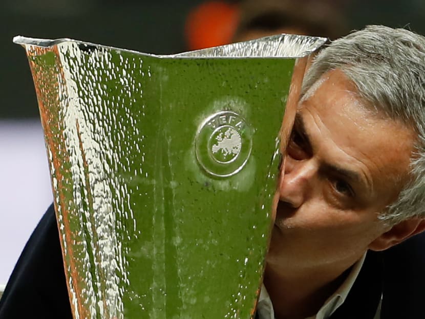 Jose Mourinho kissing the Europa League trophy after United's 2-0 win over Ajax. Photo: AFP