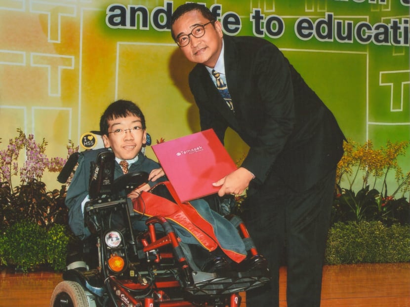 The author, seen here at his polytechnic graduation ceremony in 2017, says he does not care for the term “person with disabilities”. The author, seen here at his polytechnic graduation ceremony in 2017, says he does not care for the term “person with disabilities”.