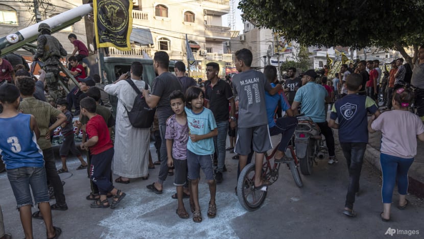 Gaza militants hold parade after latest battle with Israel Gaza militants hold parade after latest battle with Israel