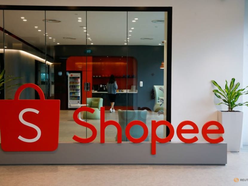 FILE PHOTO: The logo of Shopee, the e-commerce arm of Southeast Asia's Sea Ltd, is pictured at their office in Singapore, March 5, 2021. REUTERS/Edgar Su