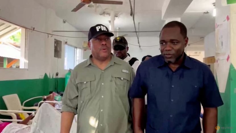 Haitian prime minister goes abroad for support after gang massacre Haitian prime minister goes abroad for support after gang massacre