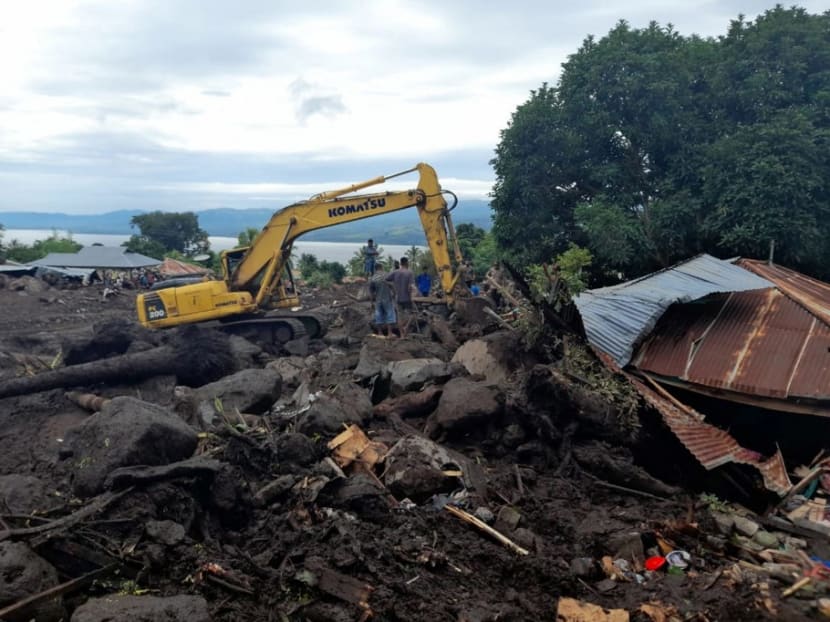 This picture taken on April 6, 2021 shows flood damage and debris in Lamanele village, East Flores, after flooding in Indonesia and East Timor left scores dead.