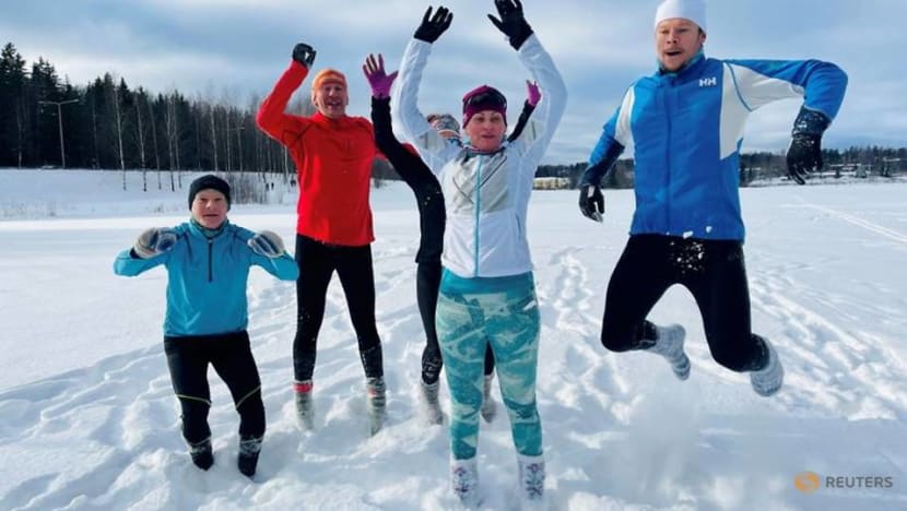 Weary of COVID restrictions, Finns take up running in deep snow in socks Weary of COVID restrictions, Finns take up running in deep snow in socks