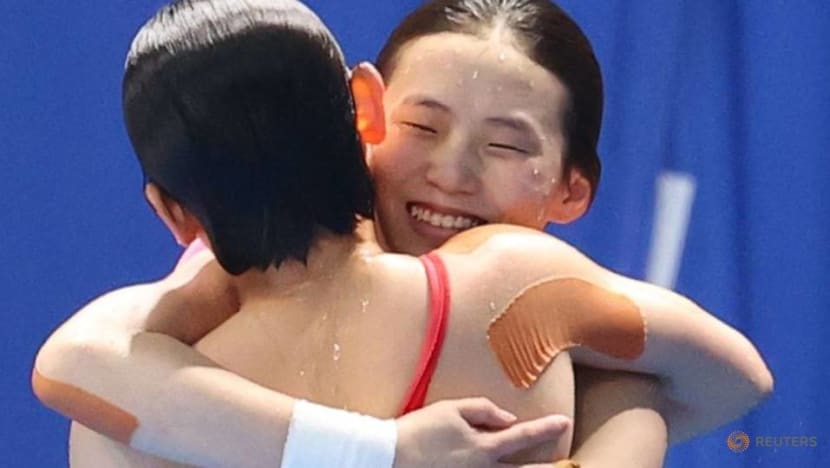 Olympics-Diving-China wins gold in women’s 10 metres synchronised platform Olympics-Diving-China wins gold in women’s 10 metres synchronised platform
