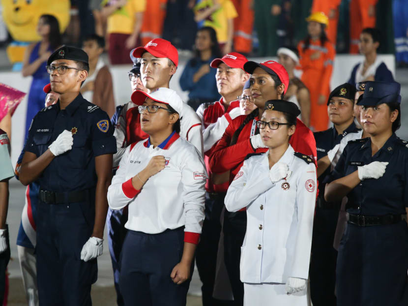 Performers reciting the pledge at the National Day Parade in 2018.