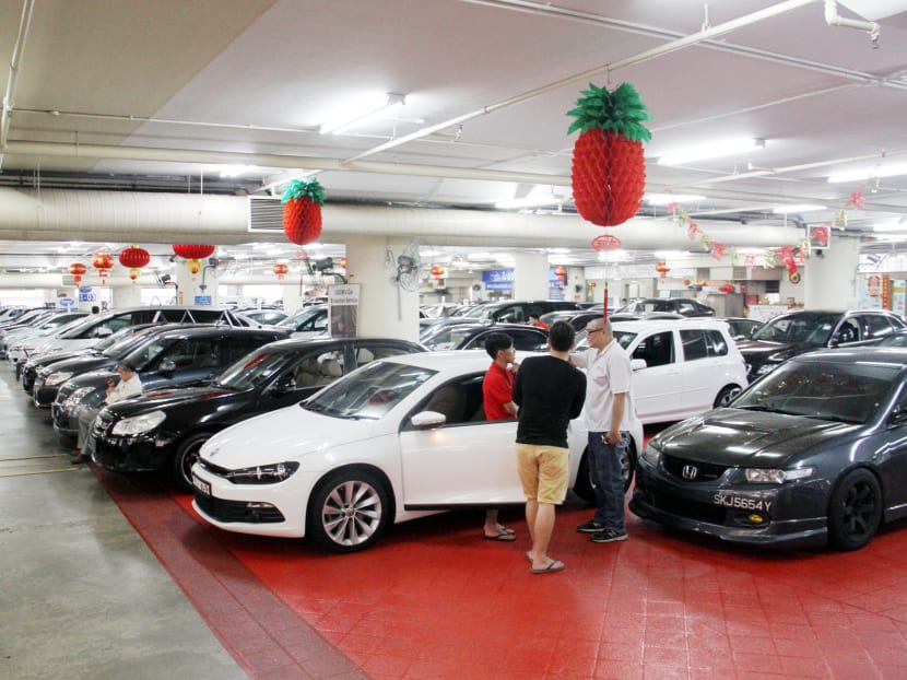 Potential car buyers at Automobile Megamart. Photo: Robin Choo/TODAY