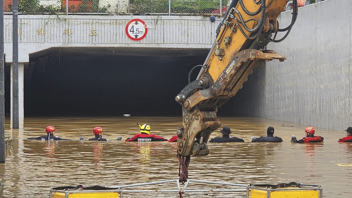 Rescuers recover last body from flooded South Korean tunnel Rescuers recover last body from flooded South Korean tunnel
