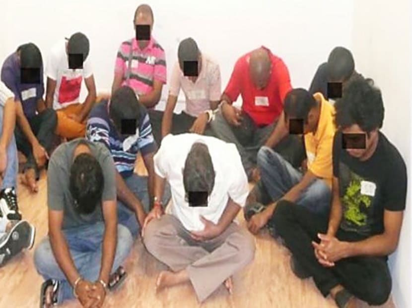 Immigration offenders arrested by the officers at the Immigration & Checkpoints Authority. Photo: ICA
