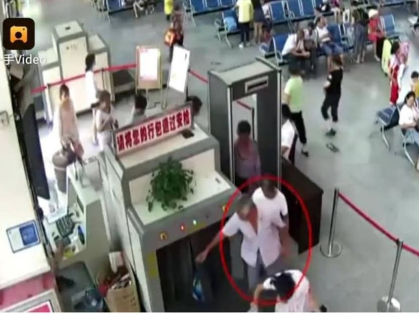 The man pictured going through the security scanner in Guizhou province. Photo: South China Morning Post via Handout