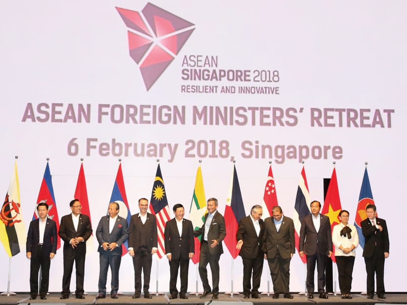 Asean Foreign Ministers, including Singapore's Vivian Balakrishnan (centre), have a group photo taken during the annual Asean Foreign Ministers’ Retreat in Singapore on February 6, 2018. The Retreat is the first gathering of Asean Foreign Ministers hosted by Singapore during its 2018 chairmanship of the grouping. Photo: Koh Mui Fong/TODAY