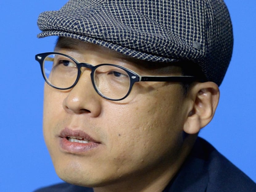 Director Kim Seong-hun of "A Hard Day" speaks onstage at "City To City" Press Conference during the 2014 Toronto International Film Festival at TIFF Bell Lightbox. File photo: AFP