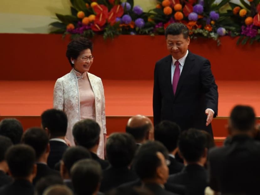 Hong Kong Chief Executive Carrie Lam with Chinese President Xi Jinping after she swore an oath of office. Photo: AFP