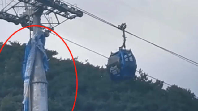 中国景区滑翔伞撞上缆车 两人坠落受重伤