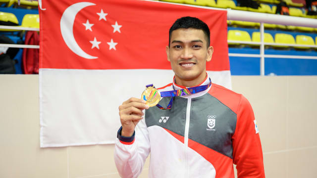 马来武术选手伊克巴尔为我国赢得本届东运首金