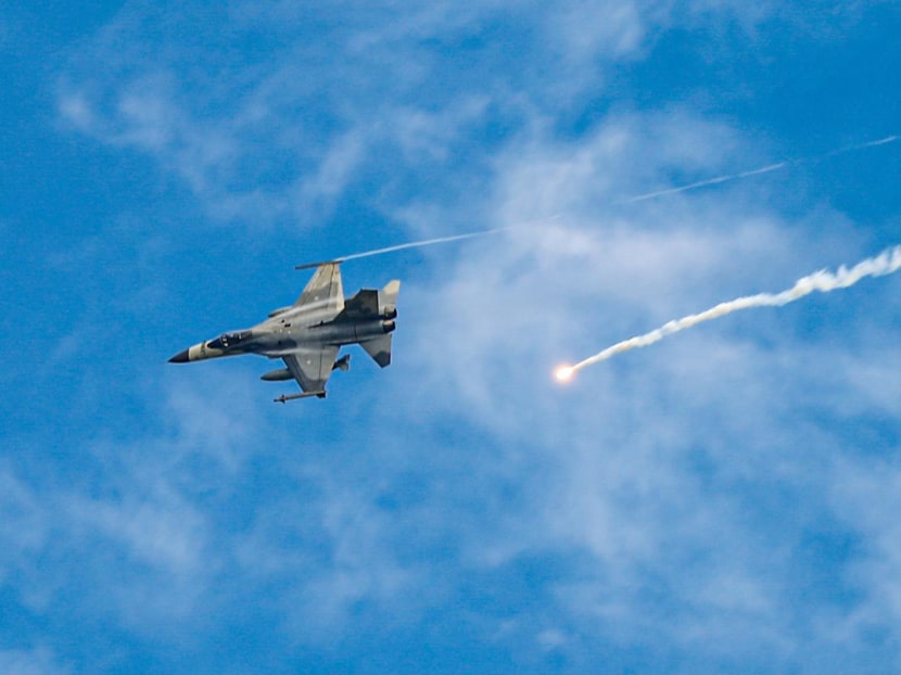 Taiwanese IDF fighter jet fires flares while maneuvering during the two-day live-fire drill, amid intensifying threats military from China, in Pingtung county, Taiwan on Sept 7, 2022. 