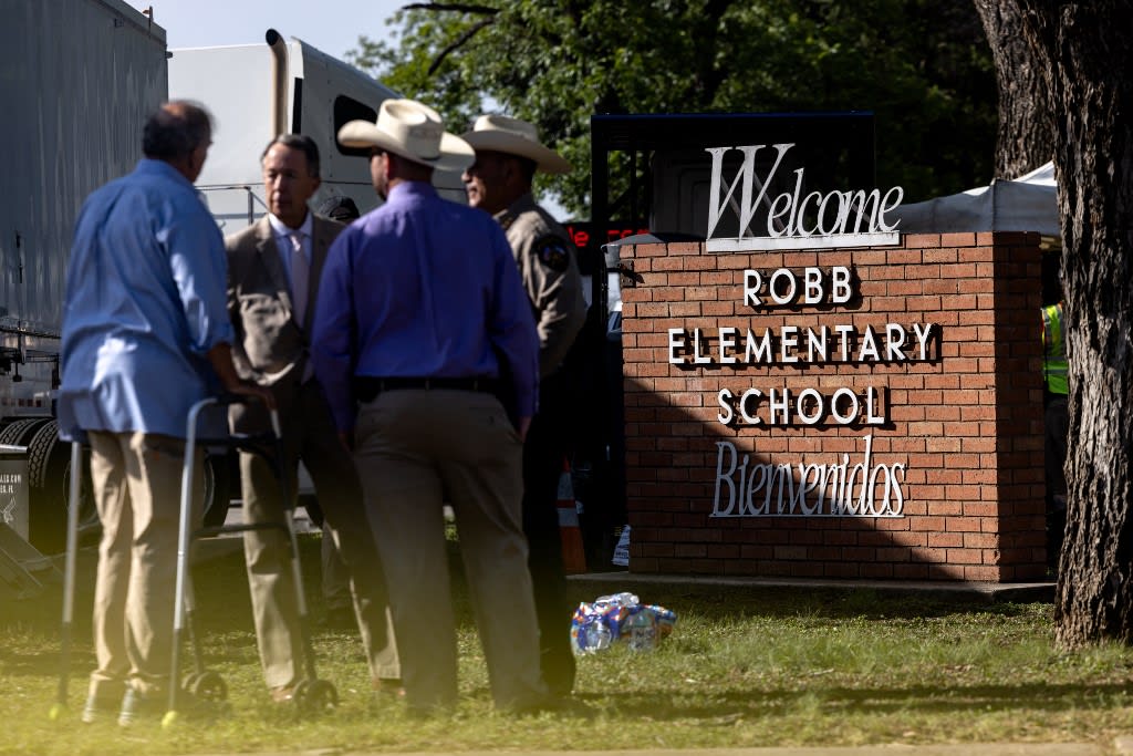 Law enforcement work on scene after a mass shooting at Robb Elementary School where 21 people were killed, including 19 children, on May 25, 2022 in Uvalde, Texas.