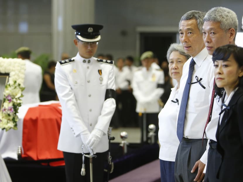 (L-R)Madam Ho Ching, PM Lee, Lee Hsien Yang and wife Lim Suet Fern waiting for the arrival of cabinet members to pay their respects. Photo: Raj Nadarajan