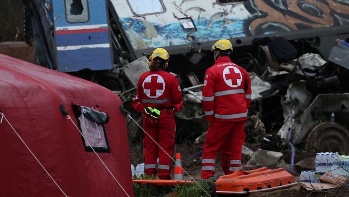 Greek rescuers comb through train crash wreckage as hopes fade Greek rescuers comb through train crash wreckage as hopes fade