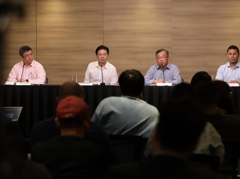 Left to right: Associate Professor Kenneth Mak, director of medical services at the Ministry of Health; Mr Lawrence Wong, Minister for National Development; Mr Gan Kim Yong, Minister for Health; and Desmond Lee, Minister for Social and Family Development chairing a media briefing on Feb 12, 2020.