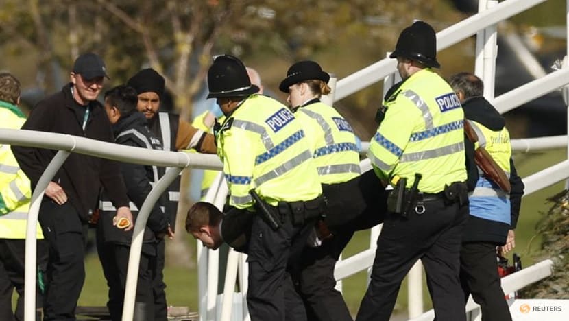 Protesters delay start of Britain's Grand National horse race Protesters delay start of Britain's Grand National horse race