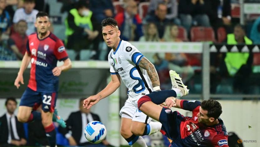 Inter take Serie A title race to final day with victory at Cagliari Inter take Serie A title race to final day with victory at Cagliari