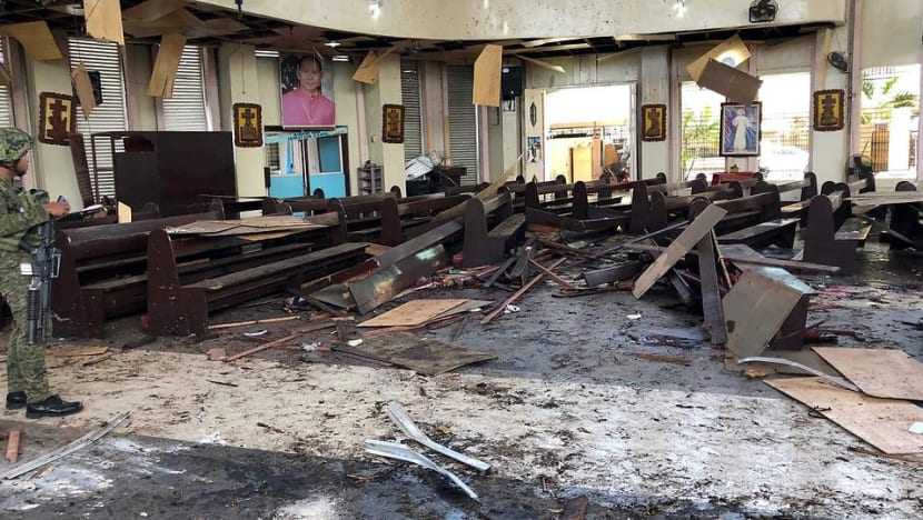 At least 21 killed in twin bombings at church in southern Philippines At least 21 killed in twin bombings at church in southern Philippines