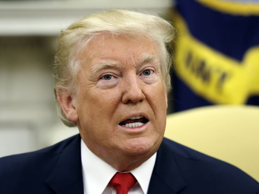 US President Donald Trump took to Twitter on Tuesday (Oct 31) to blast the "fake" media and his Democratic rivals, and called a former campaign aide who has pleaded guilty in the Russia probe a "liar". Photo: AP