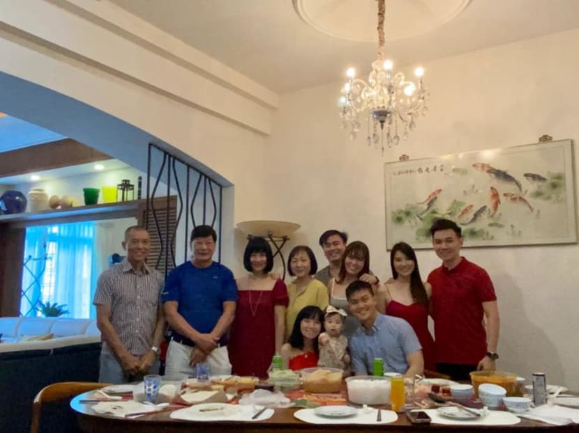 Mr Samuel Ong (centre, in grey shirt) celebrating Mother’s Day in May with his parents and wife’s family.