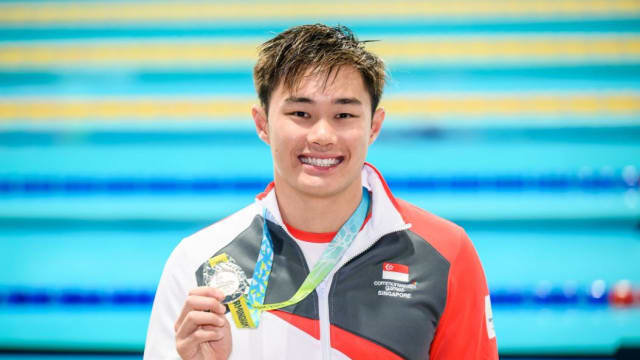 50米蝶泳夺银 张正伟为我国赢得本届共运会首面奖牌