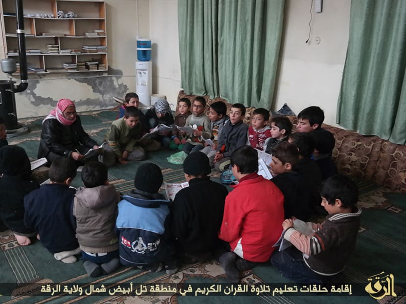 In an IS training camp, children told: Behead the doll