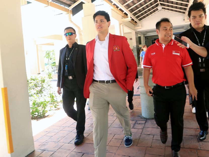Swim Schooling — the school that Olympic champion Joseph Schooling (second from left) set up in June 2018 — said that it terminated the employment of Mr Mohamed Hafidz Ja’afar (second from right) on July 19, 2019.