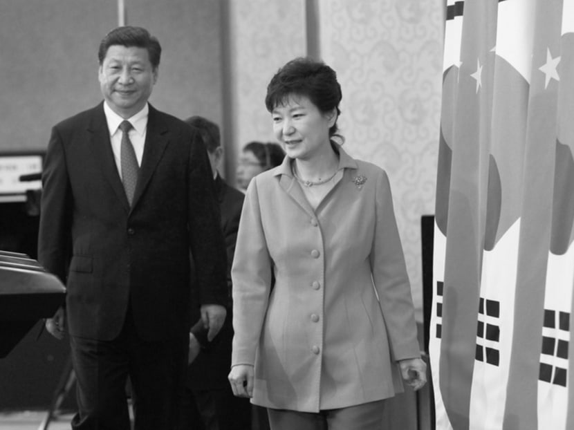 South Korean President Park Geun-hye and Mr Xi Jinping at the presidential house in Seoul during Mr Xi’s visit in July. 
The Chinese are now warming up to South Korea. PHOTO: REUTERS