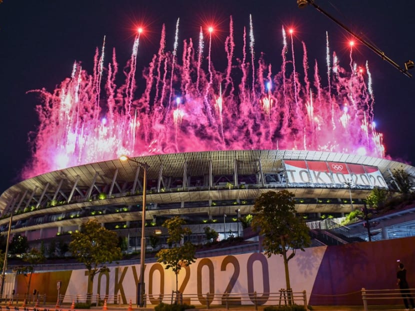 Fireworks light up the sky over the Olympic Stadium during the opening ceremony of the Tokyo 2020 Olympic Games, in Tokyo, on July 23, 2021.