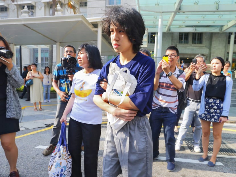 Amos Yee leaving the State Courts with his parents on July 6, 2015, after being sentenced to four weeks' jail, backdated to June 2nd. Photo. Ernest Chua Amos Yee leaving the State Courts with his parents on July 6, 2015, after being sentenced to four weeks' jail, backdated to June 2nd. Photo. Ernest Chua